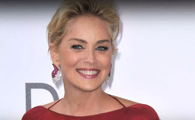 Hollywood Actress Sharon Stone Reveals Identity Of Hollywood Producer Who Told Her To Sleep With Hero - Sakshi